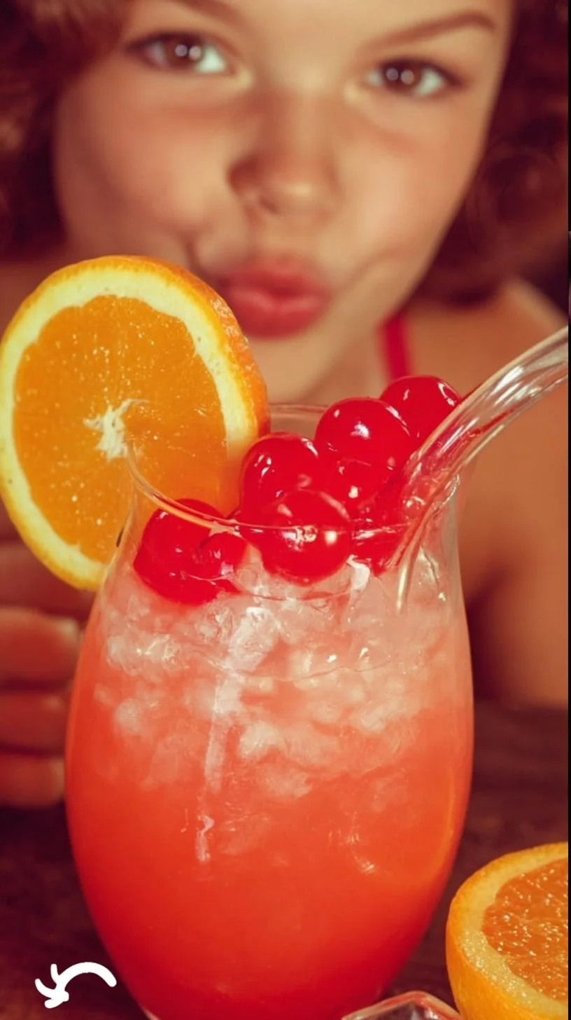 Refreshing Shirley Temple Punch recipe with colorful ingredients in a glass.